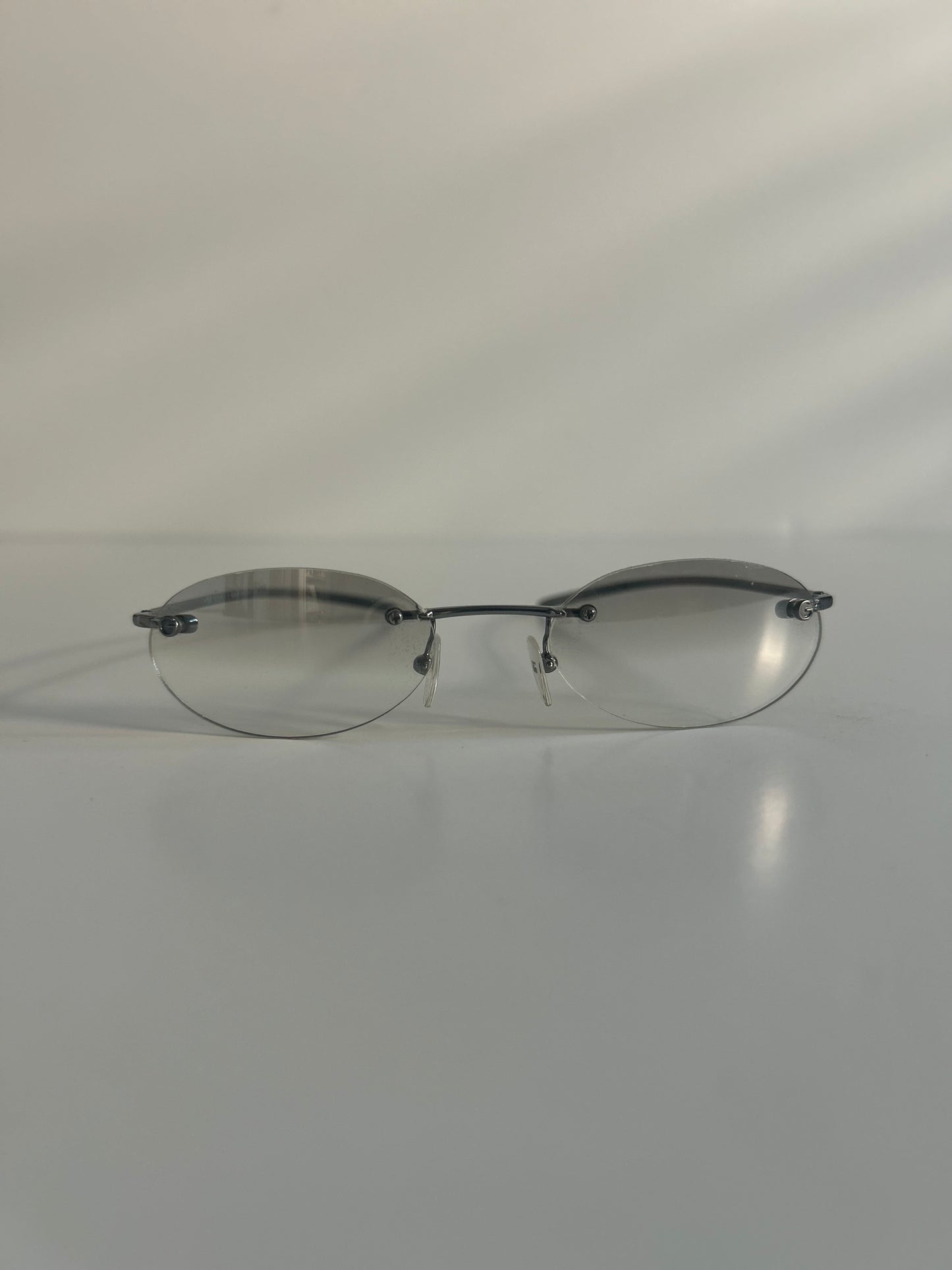 Vintage Gucci Rimless Oval Sunglasses Late 1990s to Early 2000s Tom Ford Era, circa 1998–2003