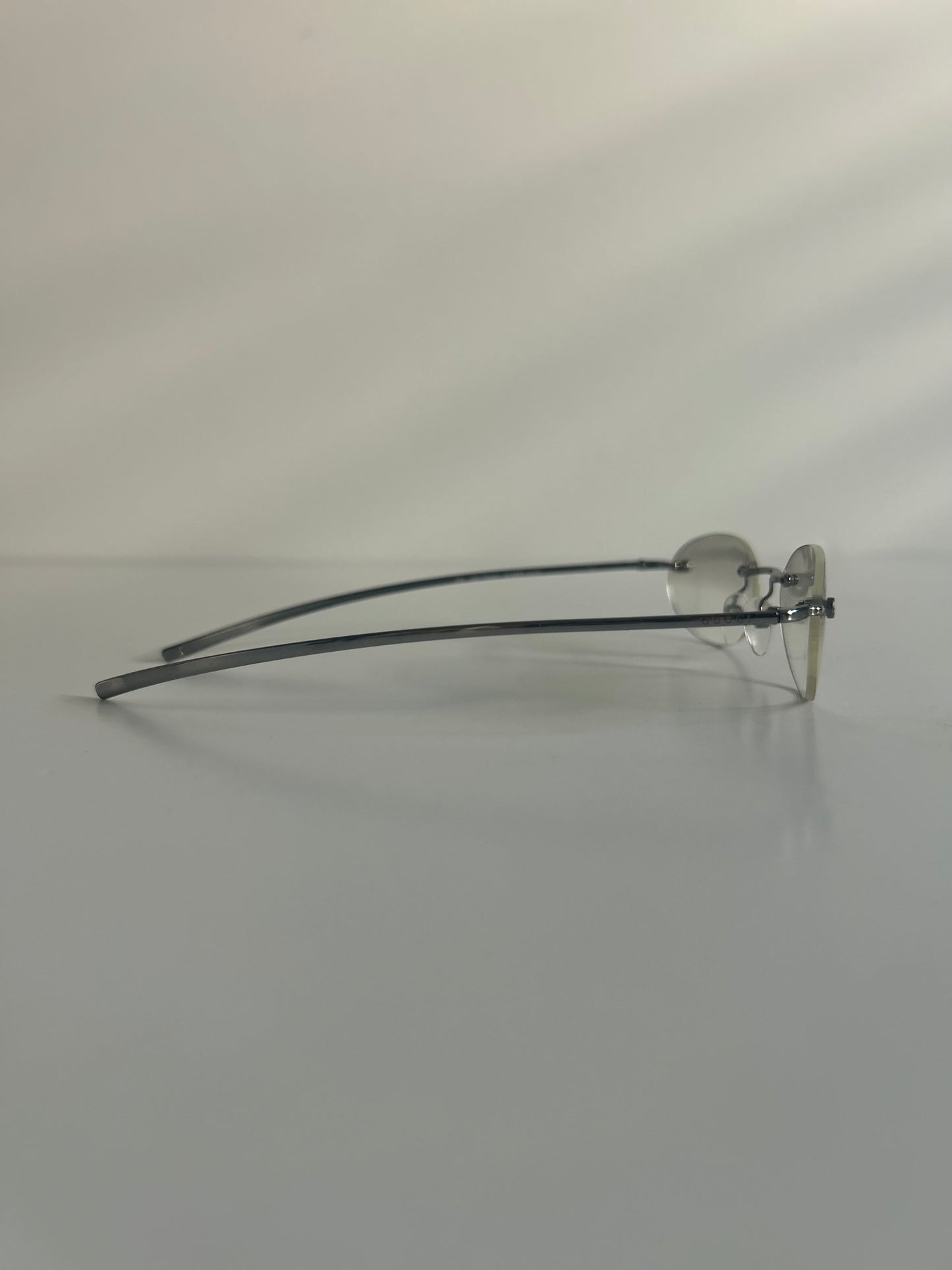 Vintage Gucci Rimless Oval Sunglasses Late 1990s to Early 2000s Tom Ford Era, circa 1998–2003