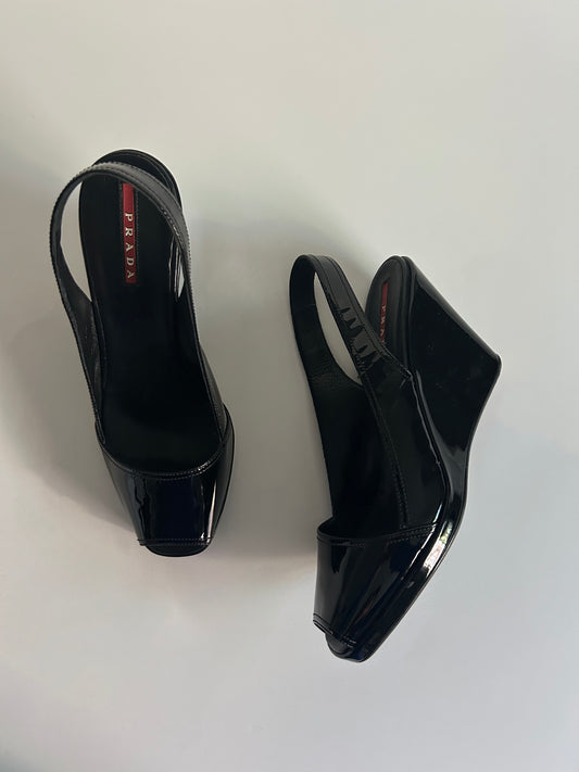 Designer Vintage Prada Patent Leather Slingback Wedge Heels
Size 37.5 EU / Approx. US 7–7.5 Early 2000s Prada Sport Era