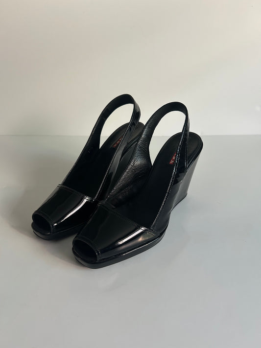Designer Vintage Prada Patent Leather Slingback Wedge Heels
Size 37.5 EU / Approx. US 7–7.5 Early 2000s Prada Sport Era